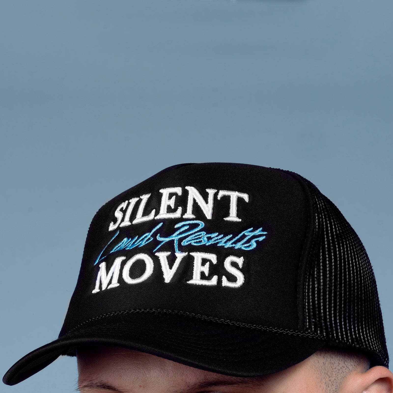 Silent Moves Loud Results Trucker Hat